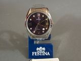a watch that is sitting on top of a table