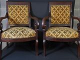 two wooden chairs with upholstered upholstered upholstered upholstered upholstered upholstered upholstered upholstered
