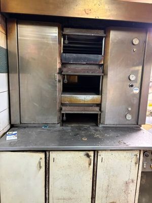 1 four à pain de marque JOURxNUIT avec ses moules anciens