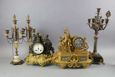 a lot of different types of clocks on the table