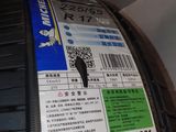 a close up of a tire with a sticker on it