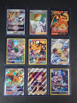 a group of pokemon cards sitting on top of a table