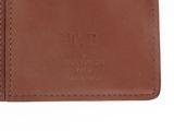 a close up of a brown leather wallet on a white background