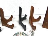 four pieces of wood and a teapot on a table