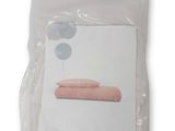 a picture of a picture of a bed in a plastic bag