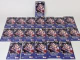 a bunch of anime trading cards sitting on top of a table