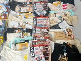 a lot of underwear and other items on a table