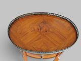 an image of a round table with a wooden top and metal legs