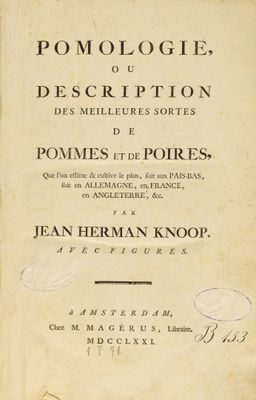 un vieux livre sur lequel figurent des inscriptions et l'image d'un cheval