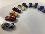 several toy cars are arranged in a circle on a white surface