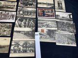 a lot of old black and white photos on the table
