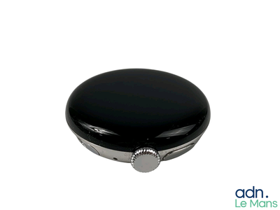 a close up of a black watch on a white background