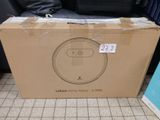 packaging for a new robotic vacuum cleaner in a store