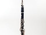 a close up of a clarinet on a white background