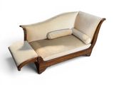 a couch that is sitting on a white surface