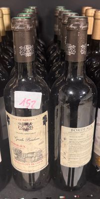 many bottles of wine that are on display in a store