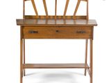 an image of a wooden desk with a drawer underneath it