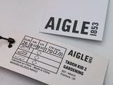 a tag that says agile on it next to a pair of scissors