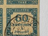 four different stamps on a piece of paper on a white surface