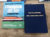 two books sitting on the floor next to each other