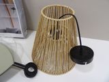 a lamp that is sitting on a table next to a mirror