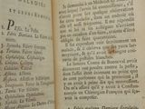 a book open on a table with some writing on it