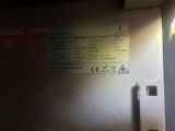 a picture of a sign on the wall of a train