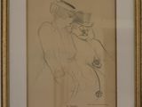 dessin encadré représentant un homme coiffé d'un chapeau et une femme en robe