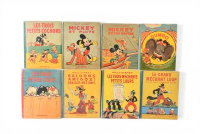 plusieurs livres pour enfants sont alignés sur une surface blanche