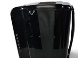 an image of a black accordion sitting on top of a white surface