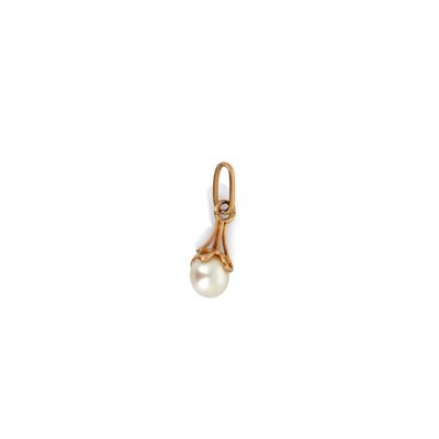 a pearl and gold charm on a white background