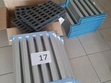 several boxes of different sizes and colors of metal