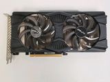 a close up of a video card with a fan on it