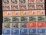 a picture of a collection of stamps on a table
