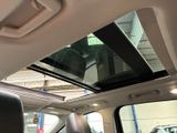 a view of the sunroof of a car from the inside