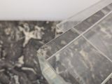 clear acrylic acrylic table with black and white marble top