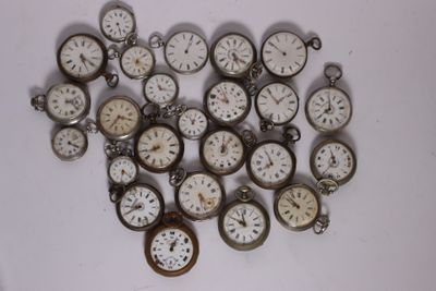 a lot of clocks that are sitting on a table