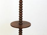 an image of a wooden table with a candle on it
