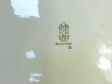 a close up of a plate with a castle on it