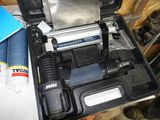 a tool box that has a hammer and other tools in it