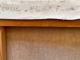 a piece of fabric with writing on it on a table