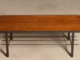 an image of a wooden table with metal legs and a wooden top
