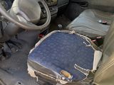 a car with a suitcase in the back of it