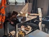 an image of a work area with a lot of work equipment