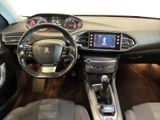 a picture of the interior of a car with a steering wheel and dashboard