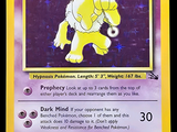 une carte Pokémon sur laquelle figure l'image d'un chien jaune