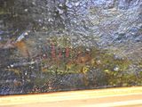 a close up of a painting on a window sill