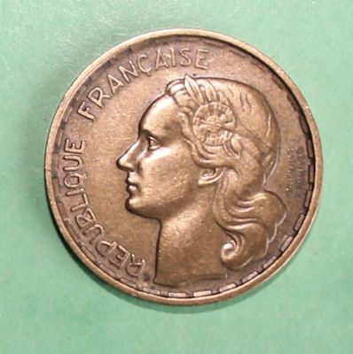 a coin with a picture of a woman on it