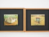 two framed pictures of sheep in a field with a barn in the background