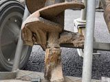 an image of a close up of a wheel on a road